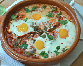 Baked Eggs With Spinach and Tomatoes