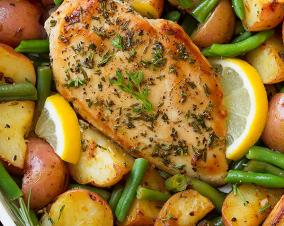 Chicken with lemon, garlic, herbs and potatoes