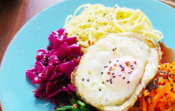 Sesame noodle plate with crispy fried egg