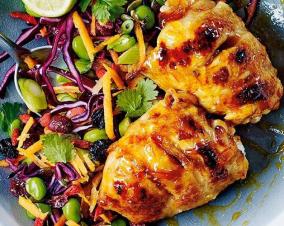 Sticky roast chicken thighs with carrot, sweetcorn and herb salad