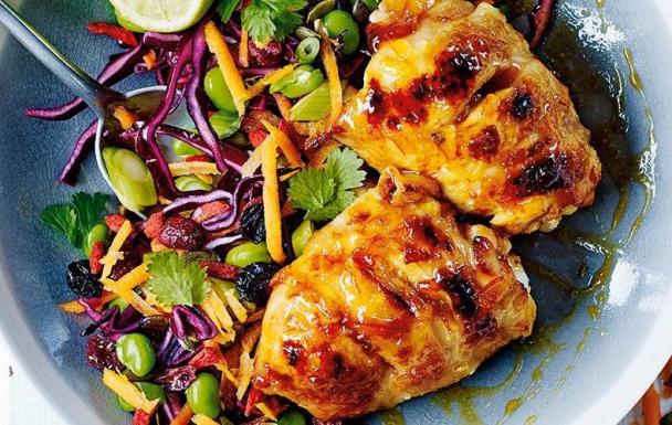 Sticky roast chicken thighs with carrot, sweetcorn and herb salad
